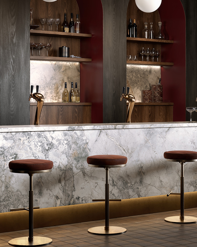 This hotel bar interior image seems to be getting a bit of attention on our social channels so we decided to share here too.
Our client asked us to create an inviting space that showcases their extensive range of melamine-faced surfaces. The design heavily features rich darker grey woodgrains paired with walnut accents. We used their white marble panels for the bar to provide a clean, modern contrast, while deep red elements and red-brown suede & gold barstools add a luxurious feel. Gold accessories like the beer pumps and moody lighting complete the look, bringing out the textures and depth of the materials. Our 3D team worked closely on the spatial layout and carefully refined the lighting to give the scene a rich, atmospheric vibe, ensuring every material was rendered with accuracy and realism.

Alongside this, we created a flatlay moodboard, offering closer views of the design elements, highlighting the textures and finishes. Many of our clients now request these moodboards to complement their marketing materials and use on their social media channels, as they help showcase the finer details of the design.