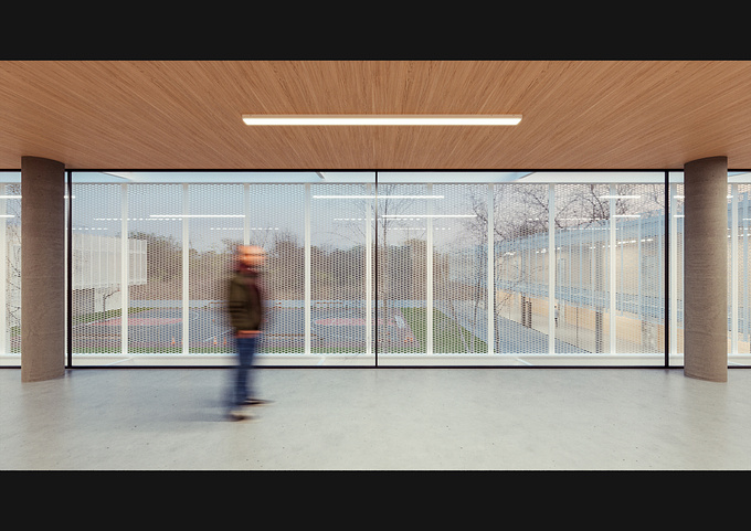 This school design redefines modern architecture with a focus on simplicity and functionality. The building features a sleek, minimalist facade where a perforated metal mesh envelops the first floor, creating a dynamic play of light and shadow. The mesh not only adds a contemporary aesthetic but also serves as a privacy screen while maintaining a connection with the outside environment. The courtyard, punctuated by neatly arranged circular patches of greenery, invites natural interaction and offers a tranquil space for students and faculty alike. This project exemplifies how modern design principles can transform educational spaces into inspiring environments for learning and growth.