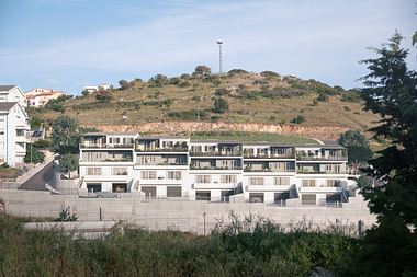 New terraced house development in Nuoro (IT): Front view