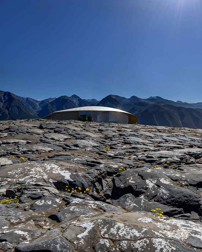 "Whirl" is a dynamic concrete cabin with a curved, whirled design, where the floor seamlessly transforms into the rooftop, creating a continuous, walkable surface that offers stunning panoramic views. 